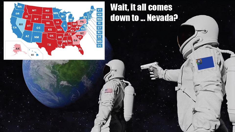 An astronaut with an American flag patch looks at a preliminary map of the election, while an astronaut with a Nevada flag patch points a gun at him. Caption: "Wait, it all comes down to... Nevada?"