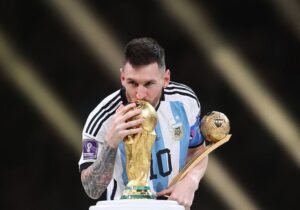 Argentina's Lionel Messi kisses the World Cup trophy