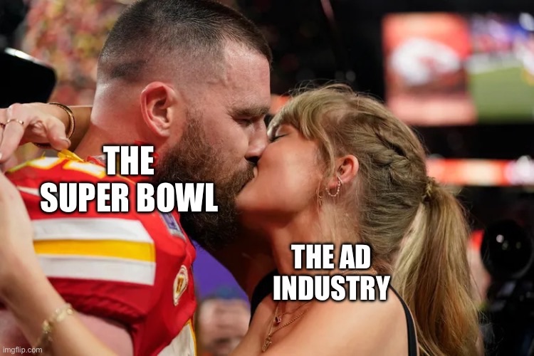 Travis Kelce, labeled "The Super Bowl," kisses Taylor Swift, labeled "The Ad Industry"